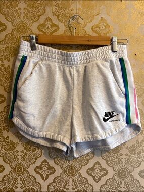 Nike Women's Light Gray Athletic Shorts with Rainbow Side Stripes